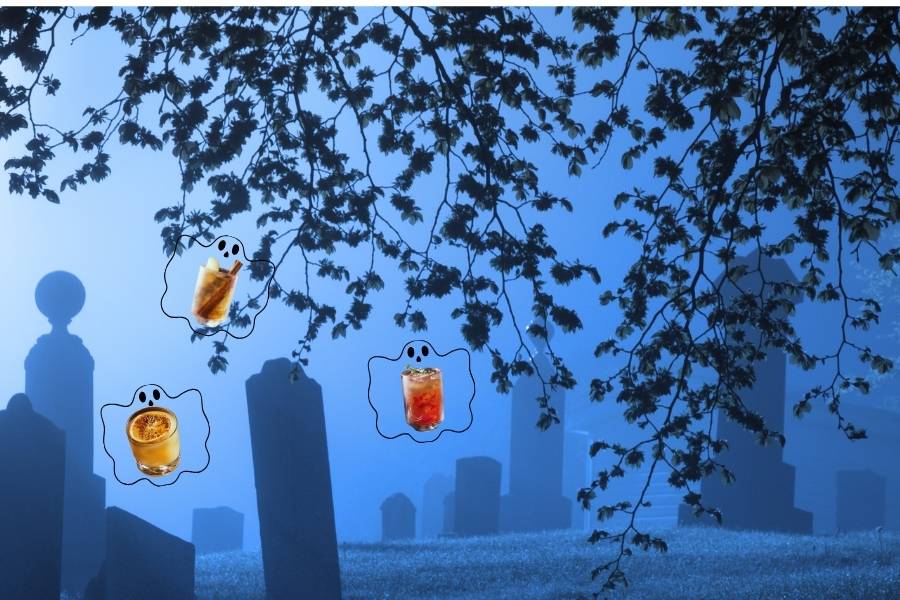 halloween mocktails floating in a cemetery