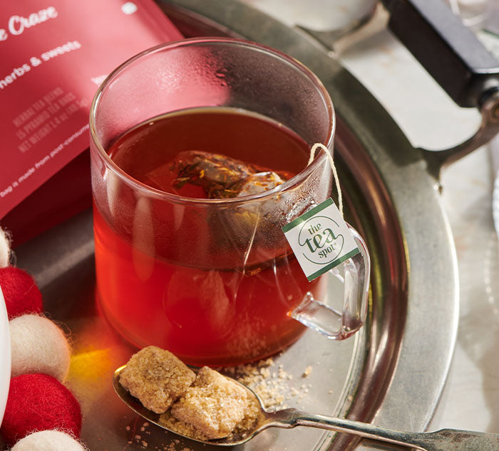 
                  
                    a brewed cup of rooibos tea sits on a tray
                  
                