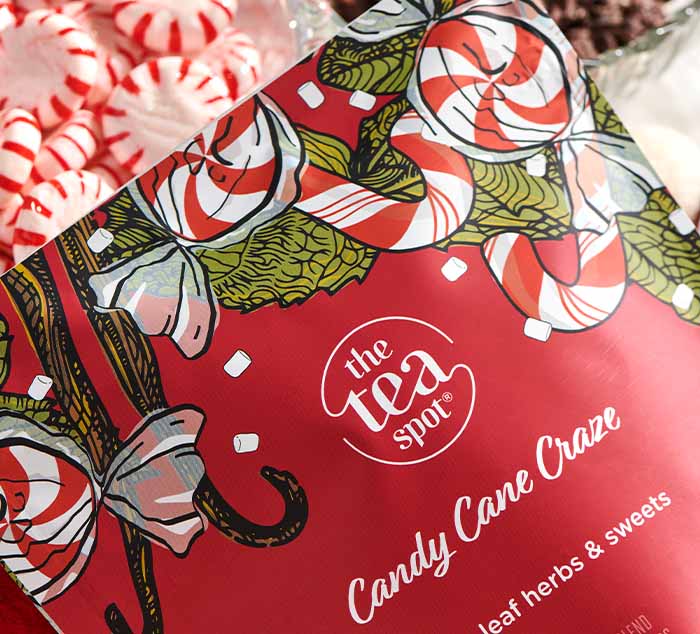 
                  
                    a red bag reading candy cane craze sits next to candies and cacao nibs

                  
                