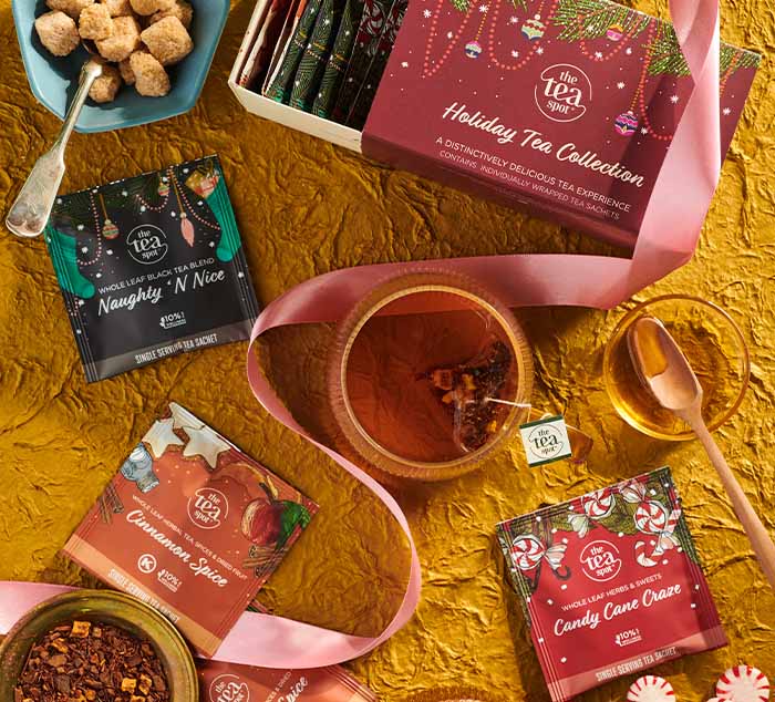 
                  
                    a box reading holiday tea collection is surrounded by christmas teas, naughty n nice, cinnamon spice, and candy cane craze
                  
                